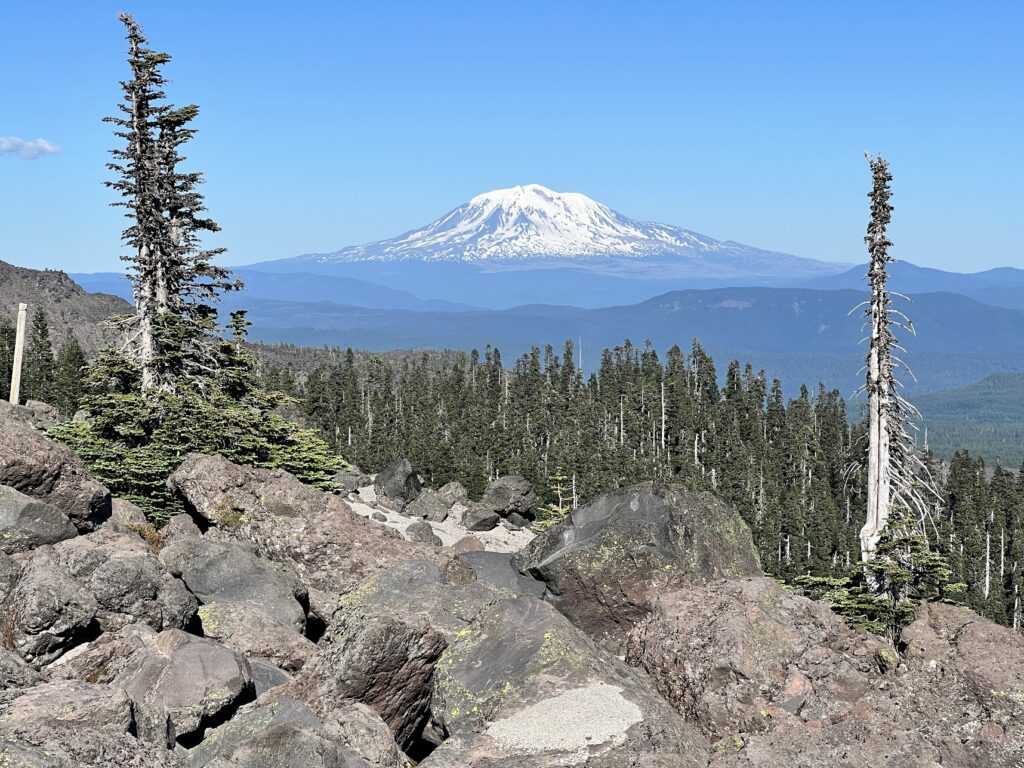 Boulders with Mt. Rainier in the background. Circumnavigating Mt St Helens, you'll see a lot of amazing views.